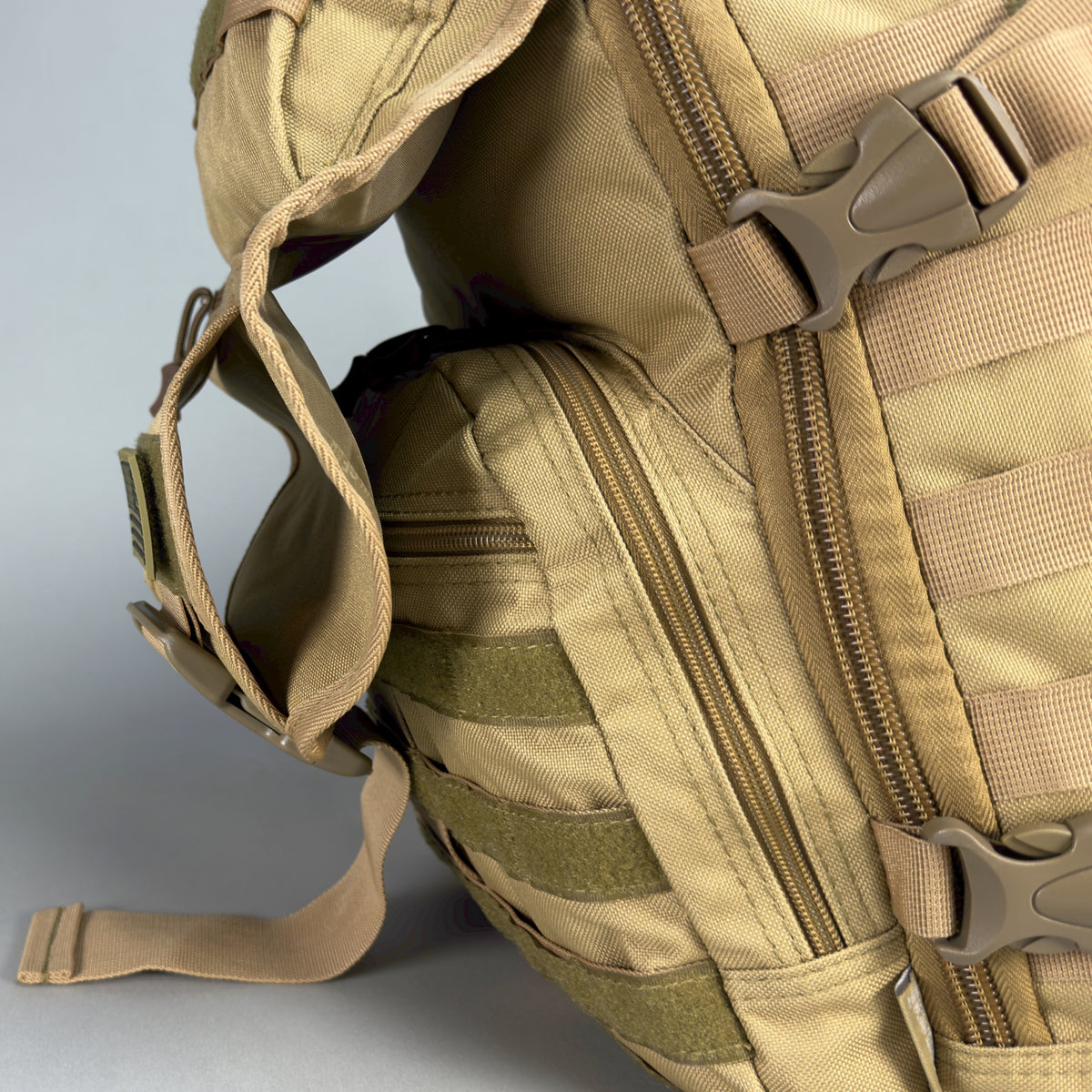 SG704 Transit 34L Commuter Laptop Backpack - front flap pass-through pocket detail