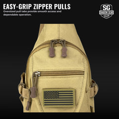 Beige sling bag with American flag patch and easy-grip zipper pulls on a black background.
