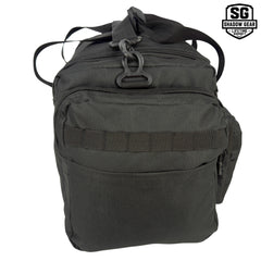 Shadow Gear Traverse 18 42L tactical duffel bag in Black, left side view showing zippered side pocket with compression sleeve