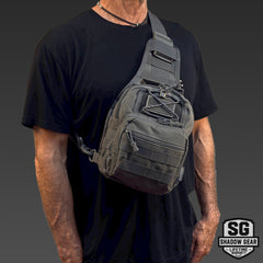 Man wearing the Shadow Gear Scout 5L tactical sling bag in Charcoal, studio lifestyle shot